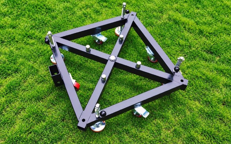 Steel tower base with leveling feet for truss pillars in outdoor event displays Steel tower base with leveling feet for truss pillars in outdoor event displays